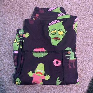 Feed me fight me zombie leggings